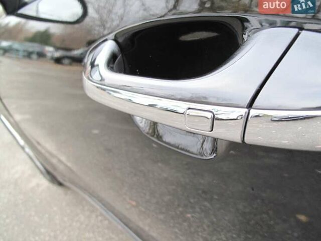 Чорний Кіа K5, об'ємом двигуна 0 л та пробігом 210 тис. км за 13900 $, фото 20 на Automoto.ua