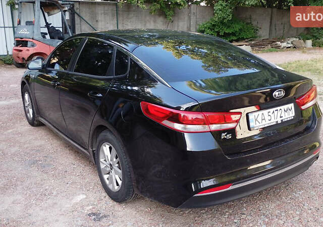 Чорний Кіа K5, об'ємом двигуна 2 л та пробігом 258 тис. км за 13500 $, фото 6 на Automoto.ua