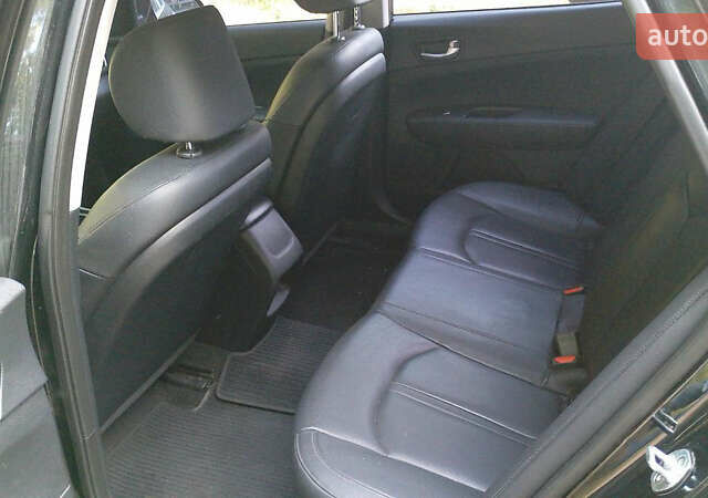 Чорний Кіа K5, об'ємом двигуна 2 л та пробігом 258 тис. км за 13500 $, фото 9 на Automoto.ua