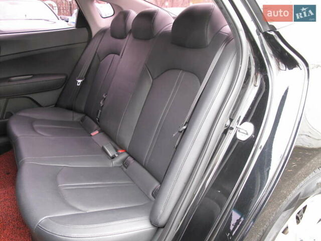 Чорний Кіа K5, об'ємом двигуна 0 л та пробігом 210 тис. км за 13900 $, фото 34 на Automoto.ua