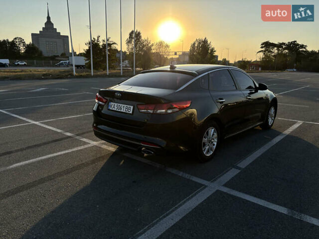 Черный Киа K5, объемом двигателя 2 л и пробегом 270 тыс. км за 12000 $, фото 6 на Automoto.ua