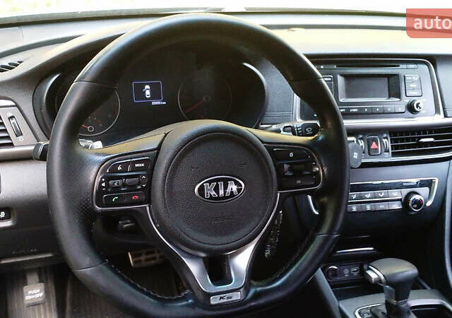 Чорний Кіа K5, об'ємом двигуна 2 л та пробігом 258 тис. км за 13500 $, фото 1 на Automoto.ua