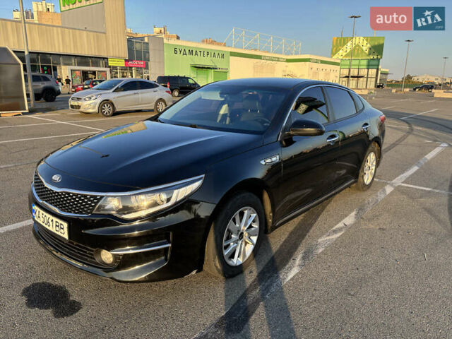 Черный Киа K5, объемом двигателя 2 л и пробегом 270 тыс. км за 12000 $, фото 2 на Automoto.ua