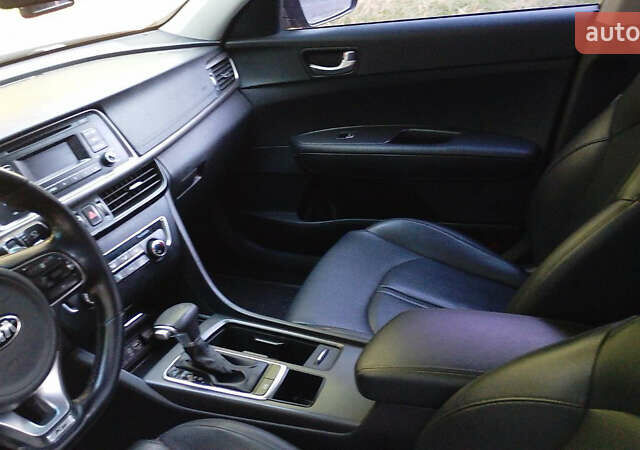 Чорний Кіа K5, об'ємом двигуна 2 л та пробігом 258 тис. км за 13500 $, фото 11 на Automoto.ua