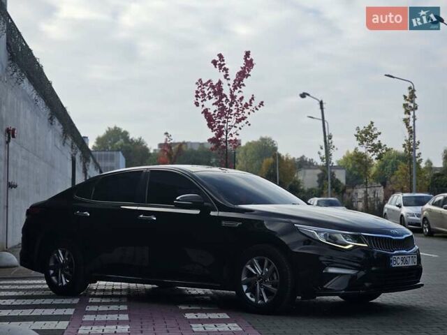 Черный Киа K5, объемом двигателя 2 л и пробегом 173 тыс. км за 14500 $, фото 1 на Automoto.ua