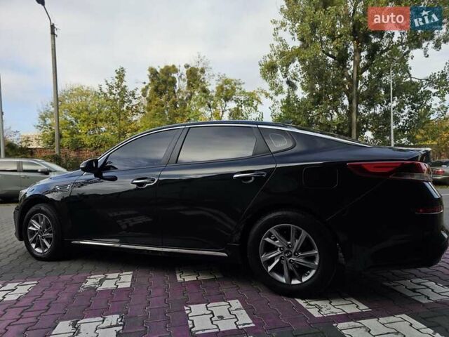 Черный Киа K5, объемом двигателя 2 л и пробегом 173 тыс. км за 14500 $, фото 24 на Automoto.ua