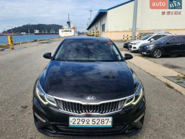 Черный Киа K5, объемом двигателя 2 л и пробегом 164 тыс. км за 11800 $, фото 1 на Automoto.ua