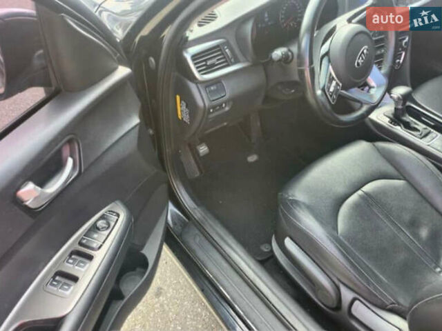 Черный Киа K5, объемом двигателя 2 л и пробегом 164 тыс. км за 11800 $, фото 14 на Automoto.ua