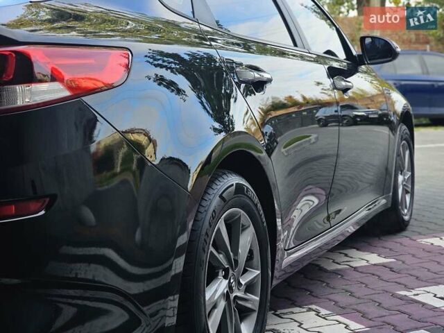 Черный Киа K5, объемом двигателя 2 л и пробегом 173 тыс. км за 14500 $, фото 10 на Automoto.ua