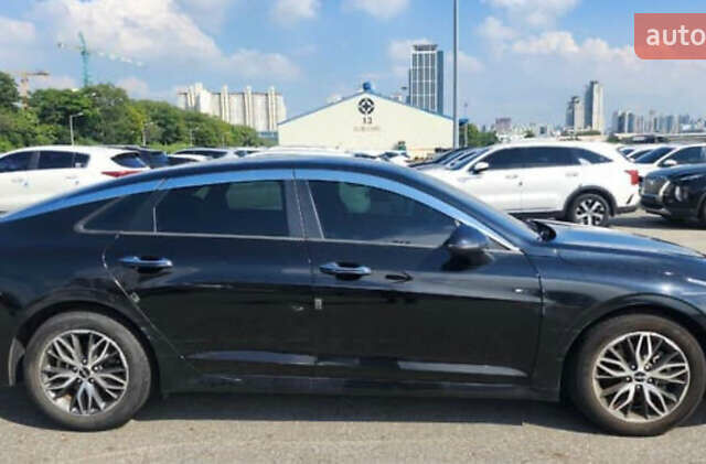 Черный Киа K5, объемом двигателя 2 л и пробегом 164 тыс. км за 12800 $, фото 2 на Automoto.ua