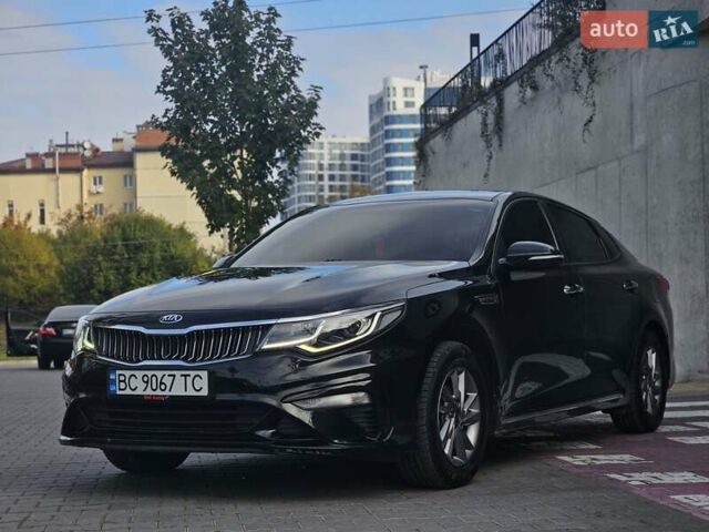 Черный Киа K5, объемом двигателя 2 л и пробегом 173 тыс. км за 14500 $, фото 12 на Automoto.ua