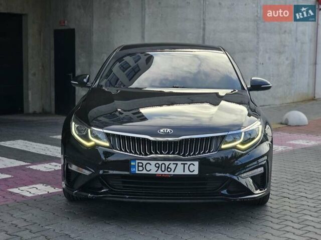 Черный Киа K5, объемом двигателя 2 л и пробегом 173 тыс. км за 14500 $, фото 7 на Automoto.ua