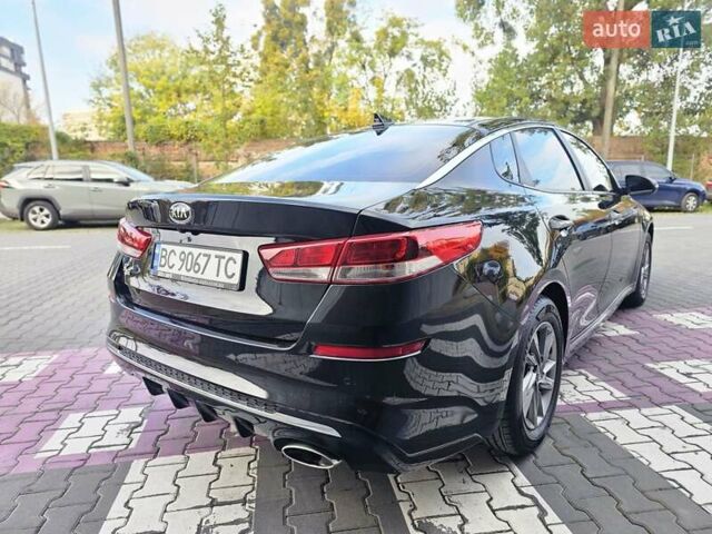 Черный Киа K5, объемом двигателя 2 л и пробегом 173 тыс. км за 14500 $, фото 3 на Automoto.ua
