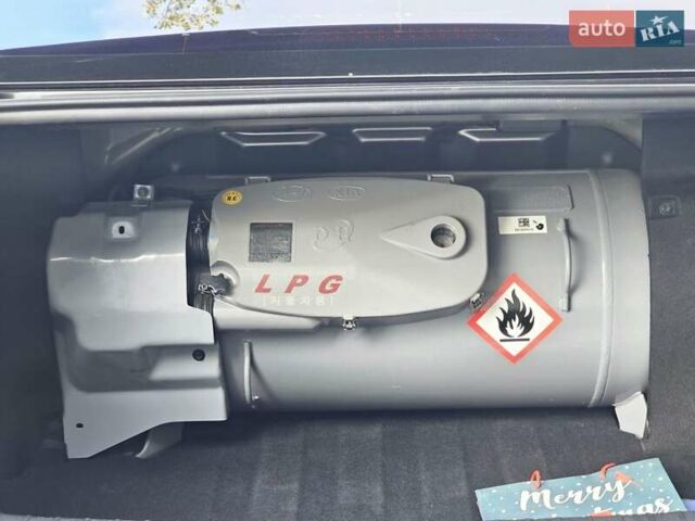 Черный Киа K5, объемом двигателя 2 л и пробегом 173 тыс. км за 14500 $, фото 21 на Automoto.ua