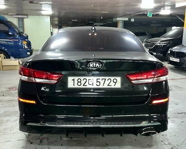 Черный Киа K5, объемом двигателя 0 л и пробегом 21 тыс. км за 12800 $, фото 2 на Automoto.ua