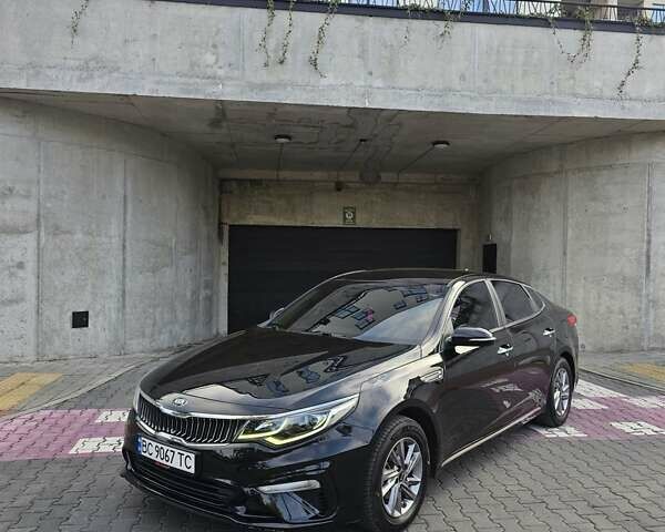 Черный Киа K5, объемом двигателя 2 л и пробегом 173 тыс. км за 14500 $, фото 6 на Automoto.ua