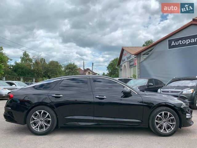 Чорний Кіа K5, об'ємом двигуна 2 л та пробігом 155 тис. км за 21250 $, фото 1 на Automoto.ua