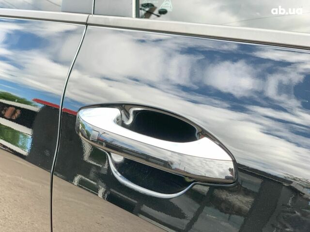 Чорний Кіа K5, об'ємом двигуна 2 л та пробігом 155 тис. км за 21290 $, фото 11 на Automoto.ua