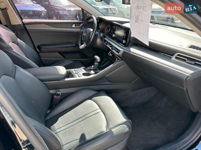 Черный Киа K5, объемом двигателя 2 л и пробегом 155 тыс. км за 21490 $, фото 16 на Automoto.ua