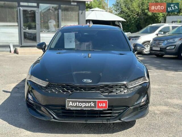 Черный Киа K5, объемом двигателя 2 л и пробегом 155 тыс. км за 21490 $, фото 1 на Automoto.ua