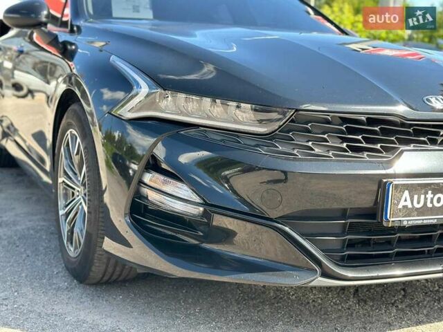 Черный Киа K5, объемом двигателя 2 л и пробегом 155 тыс. км за 21490 $, фото 2 на Automoto.ua