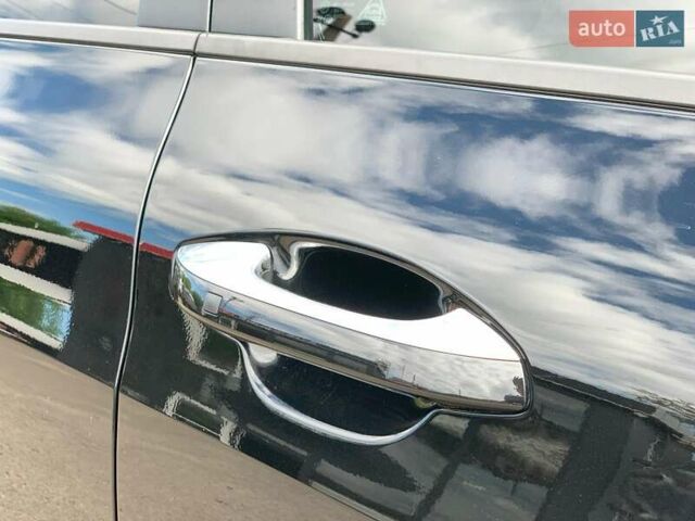 Чорний Кіа K5, об'ємом двигуна 2 л та пробігом 155 тис. км за 21250 $, фото 11 на Automoto.ua