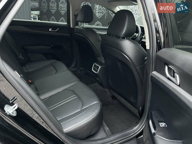 Черный Киа K5, объемом двигателя 2 л и пробегом 155 тыс. км за 19200 $, фото 11 на Automoto.ua