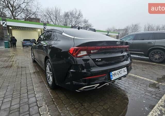 Черный Киа K5, объемом двигателя 2 л и пробегом 145 тыс. км за 21500 $, фото 2 на Automoto.ua