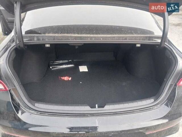 Черный Киа K5, объемом двигателя 1.6 л и пробегом 110 тыс. км за 13300 $, фото 6 на Automoto.ua