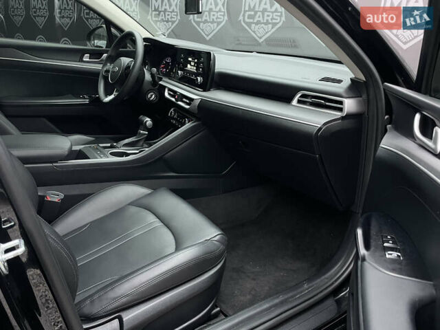 Черный Киа K5, объемом двигателя 2 л и пробегом 155 тыс. км за 19200 $, фото 13 на Automoto.ua