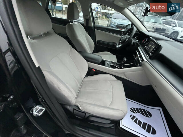 Черный Киа K5, объемом двигателя 1.6 л и пробегом 109 тыс. км за 20500 $, фото 27 на Automoto.ua