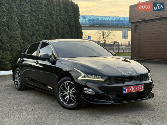 Черный Киа K5, объемом двигателя 2 л и пробегом 137 тыс. км за 22900 $, фото 1 на Automoto.ua