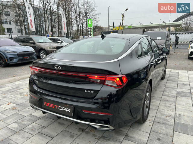 Черный Киа K5, объемом двигателя 1.6 л и пробегом 109 тыс. км за 20500 $, фото 12 на Automoto.ua