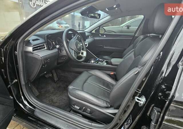 Черный Киа K5, объемом двигателя 2 л и пробегом 145 тыс. км за 21500 $, фото 11 на Automoto.ua