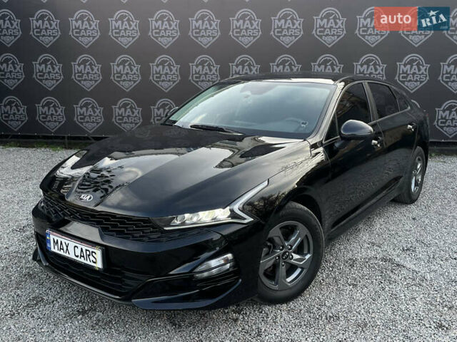 Черный Киа K5, объемом двигателя 2 л и пробегом 155 тыс. км за 19200 $, фото 2 на Automoto.ua