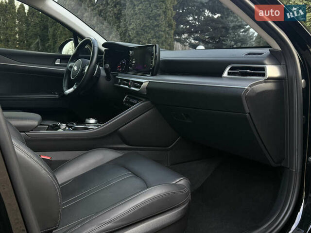 Черный Киа K5, объемом двигателя 2 л и пробегом 137 тыс. км за 22900 $, фото 24 на Automoto.ua