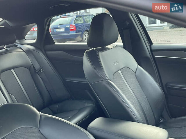 Черный Киа K5, объемом двигателя 1.6 л и пробегом 7 тыс. км за 23199 $, фото 48 на Automoto.ua