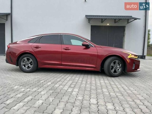 Красный Киа K5, объемом двигателя 1.6 л и пробегом 52 тыс. км за 20500 $, фото 1 на Automoto.ua
