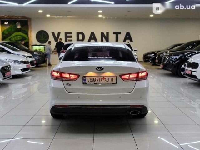 Кіа K5, об'ємом двигуна 2 л та пробігом 173 тис. км за 12000 $, фото 4 на Automoto.ua