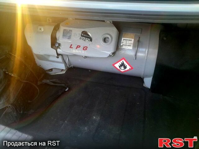 Кіа K5, об'ємом двигуна 2 л та пробігом 198 тис. км за 8200 $, фото 4 на Automoto.ua