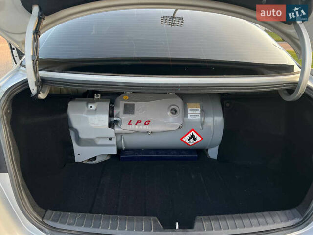 Киа K5, объемом двигателя 2 л и пробегом 190 тыс. км за 11700 $, фото 12 на Automoto.ua