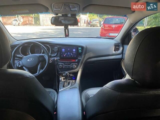 Серый Киа K5, объемом двигателя 2 л и пробегом 250 тыс. км за 10200 $, фото 14 на Automoto.ua