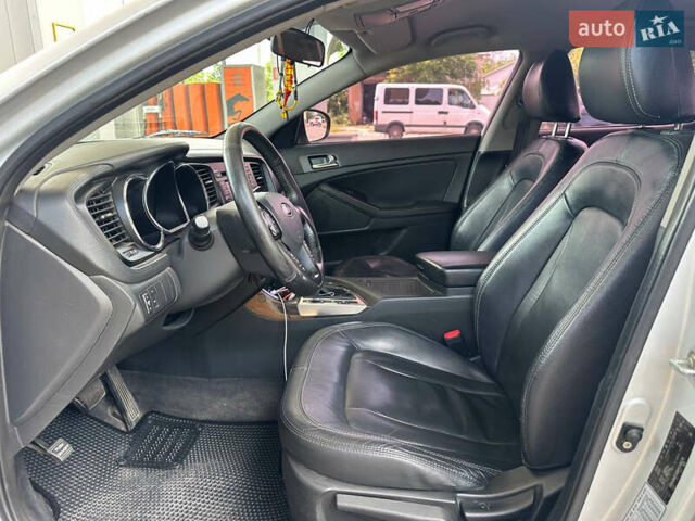 Серый Киа K5, объемом двигателя 2 л и пробегом 220 тыс. км за 8000 $, фото 14 на Automoto.ua