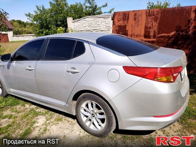 Серый Киа K5, объемом двигателя 2 л и пробегом 248 тыс. км за 7500 $, фото 2 на Automoto.ua