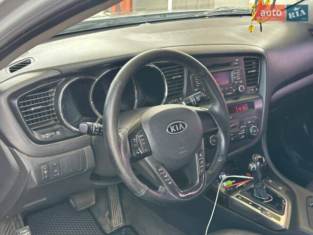 Серый Киа K5, объемом двигателя 2 л и пробегом 220 тыс. км за 8000 $, фото 15 на Automoto.ua