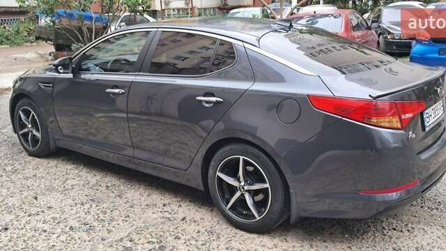 Серый Киа K5, объемом двигателя 2 л и пробегом 160 тыс. км за 9500 $, фото 12 на Automoto.ua