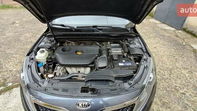 Серый Киа K5, объемом двигателя 2 л и пробегом 160 тыс. км за 9500 $, фото 27 на Automoto.ua