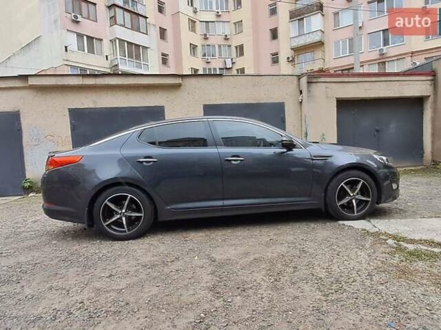 Серый Киа K5, объемом двигателя 2 л и пробегом 160 тыс. км за 9500 $, фото 4 на Automoto.ua