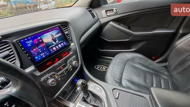 Серый Киа K5, объемом двигателя 2 л и пробегом 160 тыс. км за 9500 $, фото 24 на Automoto.ua