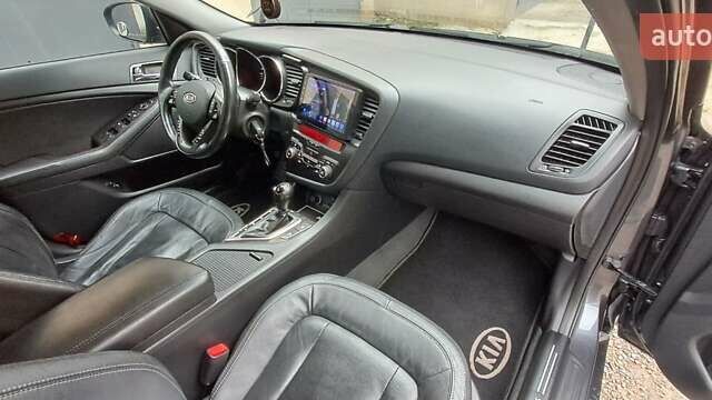 Серый Киа K5, объемом двигателя 2 л и пробегом 160 тыс. км за 9500 $, фото 23 на Automoto.ua